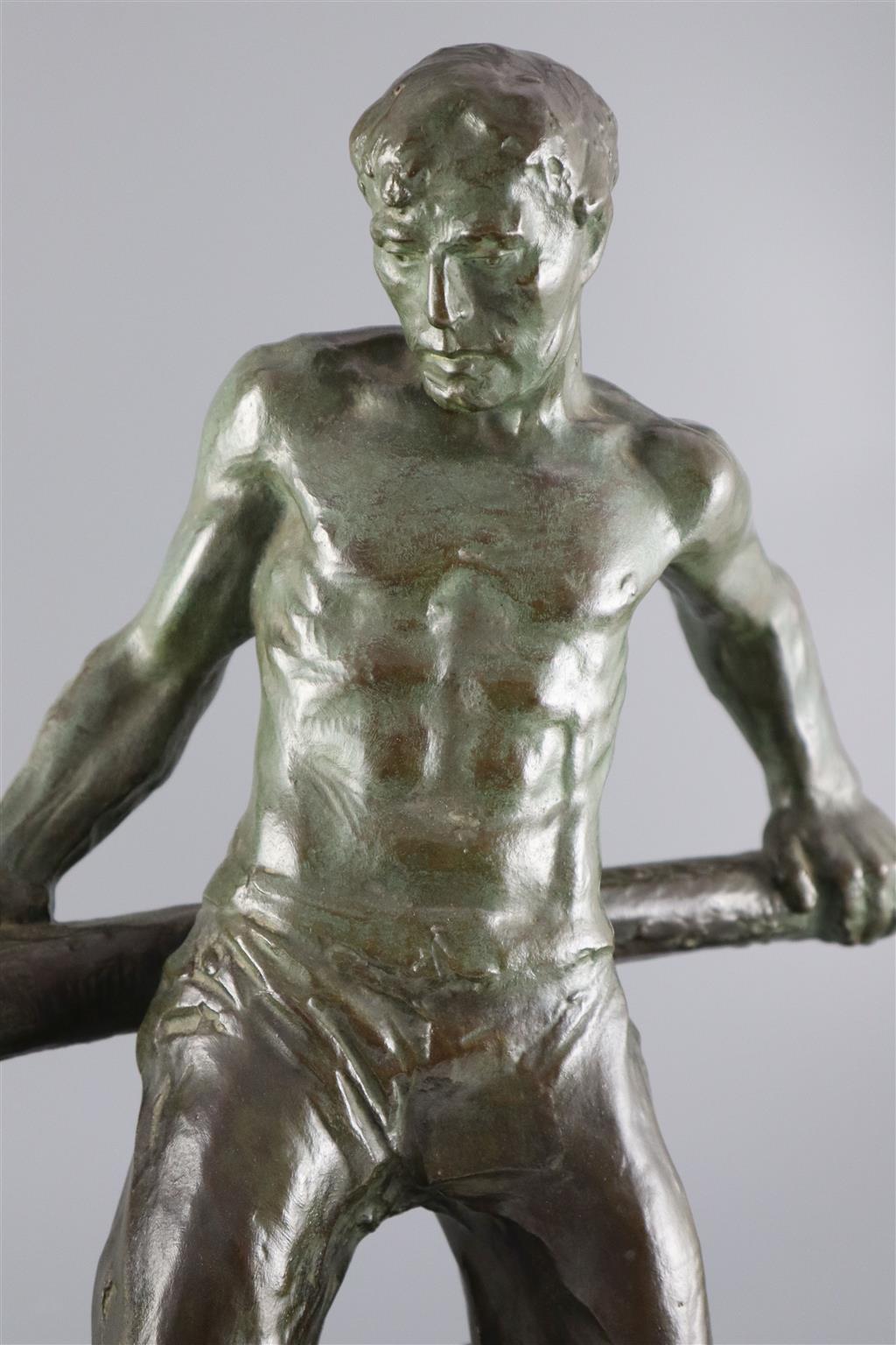 Victor Demanet (1895-1964). A bronze figure of a barge man operating a lock gate, width 26in. height 17in.